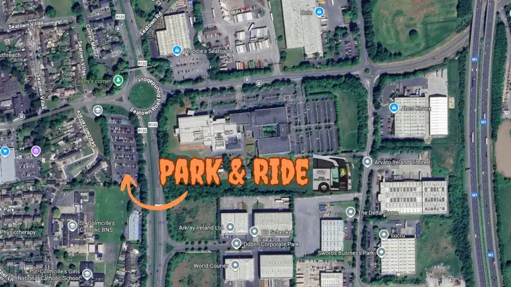 A satellite map view highlights a "Park & Ride" area—perfect for visitors heading to Pumpkins After Dark: Ireland's Spectacular Halloween Experience—with large orange text and an arrow pointing to a parking lot near buildings and roads in a suburban area.